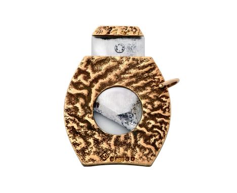 An Elizabeth II Silver Cigar-Cutter,  by Alfred Dunhill and Sons, London, 1960, 9ct shaped oval and with an overall textured 