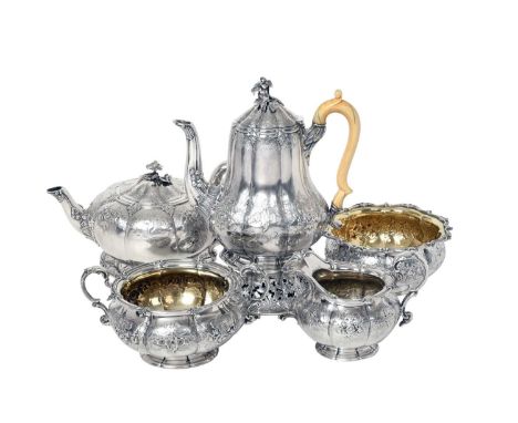 A Six-Piece Victorian Silver Tea and Coffee-Service,  by Robert Garrard, London, 1838  each lobed tapering cylindrical and on