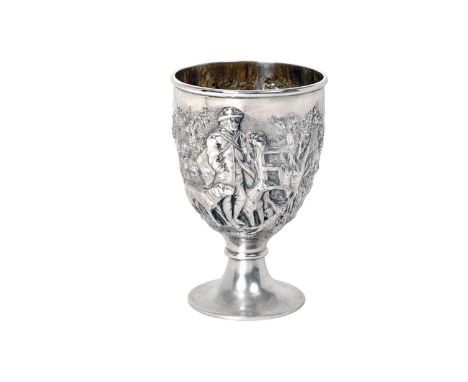 A Victorian Silver Goblet,  by James Barclay Hennell, London, 1880 tapering and on spreading foot, the bowl chased on one sid