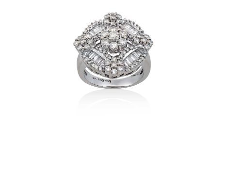 A Diamond Cluster Ringthe central cluster of round brilliant cut diamonds to smaller clusters at four points, conjoined by ro