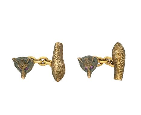 A Pair of Victorian Ruby Set Fox Mask Cufflinksthe yellow textured fox mask chain linked to a tail motif, with round cabochon