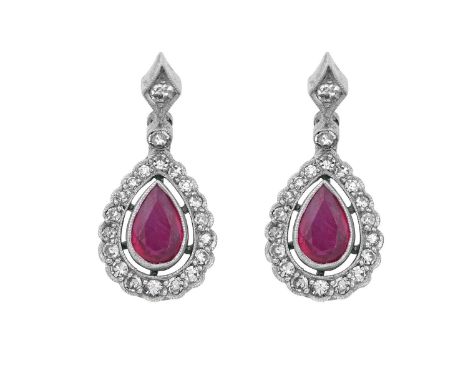 A Pair of Ruby and Diamond Drop Earringsa pear cut ruby to a spaced border of eight-cut diamonds, surmounted by a pair of eig