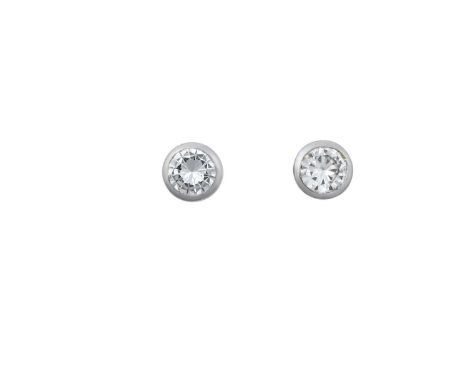 A Pair of 18 Carat White Gold Diamond Solitaire Earringsthe round brilliant cut diamonds in white rubbed over settings, total