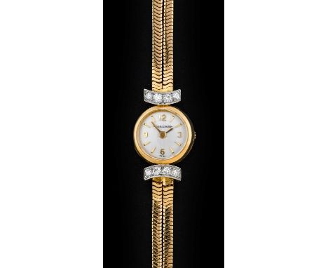 Jaeger leCoultre: A Lady's 18 Carat Gold Diamond Set Back Wind Wristwatch, signed Jaeger LeCoultre, circa 1960, manual wound 