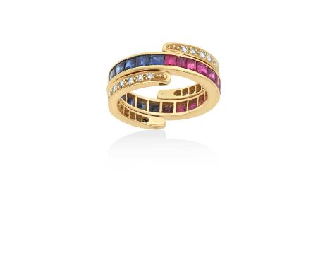 An 18 Carat Gold Ruby, Sapphire and Diamond Eternity 'Flip' Ringthe main band comprised of calibré cut rubies on one half and