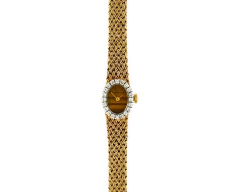 Bueche Girod: A Lady's 9 Carat Gold Diamond Set Wristwatch, signed Bueche Girod, circa 1976, manual wound lever movement sign