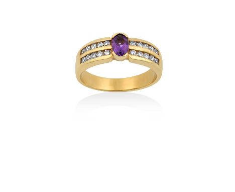 An Amethyst and Diamond Ringthe oval cut amethyst in a half rubbed over setting, to double row eight-cut diamond channel set 