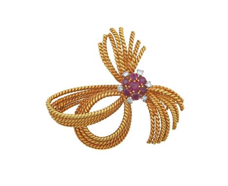 An 18 Carat Gold Ruby and Diamond Broochthe yellow rope twist ribbon motif gathered centrally by a cluster of round cut rubie