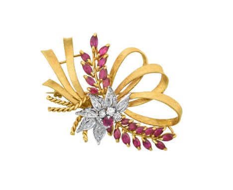 A Ruby and Diamond Broochrealistically modelled as a floral spray and ribbon motif, the central cluster formed of an oval cut