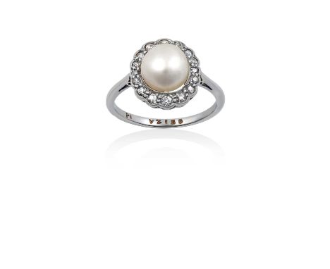 A Pearl and Diamond Cluster Ringthe button pearl within a border of old cut diamonds, in white millegrain settings, to a tape