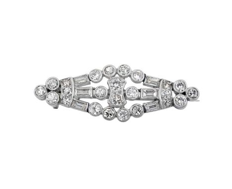 A Diamond Broochthe openwork lozenge motif set throughout with old cut, round brilliant cut and baguette cut diamonds, in whi