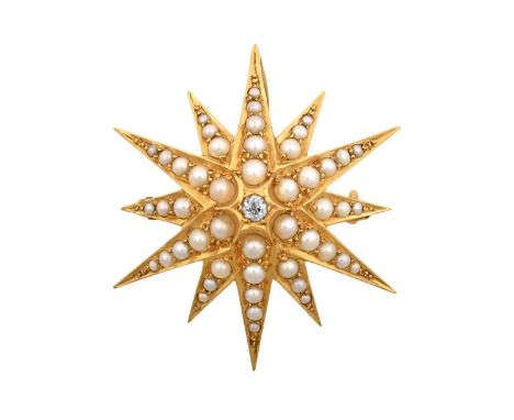A Split Pearl and Diamond Brooch/Pendant, circa 1900realistically modelled as a twelve rayed star, with an old cut diamond ce