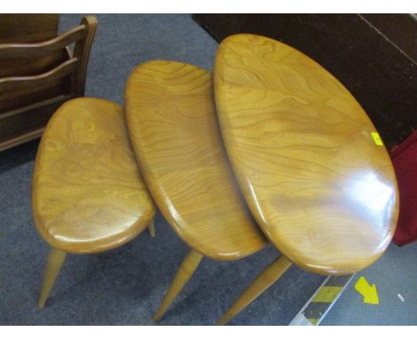 An Ercol nest of three pebble tablesLocation: RAB 