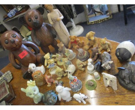 A quantity of wooden, china and composition models of animals to include Bing &amp; Grondahl, a Kirsten Blay model of a duck 