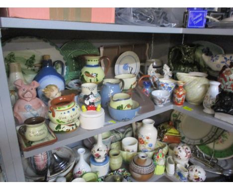 Mixed ceramics to include a Winstanley style model of a black cat, Poole pottery, a Wade piggy money box, vintage jugs, Royal