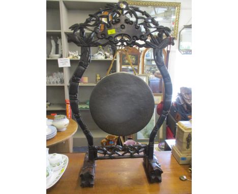 A 1930's Burmese gong stand with metal gong and later gong beaterLocation: RAB 