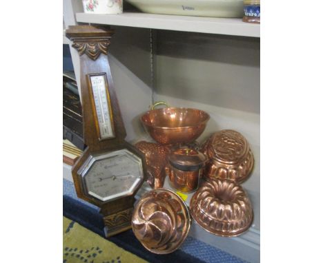 Collectables to include copper kitchen jelly moulds, a pan, three corkscrews and an oak cased aneroid barometer 