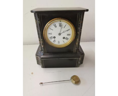 A slate and marble mantel clock Location: 6.6 