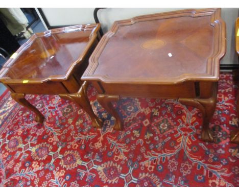 A pair of American yew lamp tables having a side drawer above ball and claw feet Location: LAF 