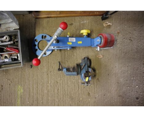 A bench vice and a wheel arch flaring tool