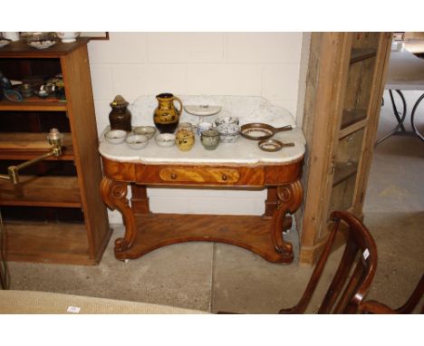 A Victorian satin walnut console wash stand with un-associated smaller marble top
