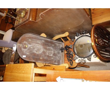 A vintage bagatelle board; a light wood tub shaped kitchen chair; a loom style linen basket; a wrought metal frame convex wal