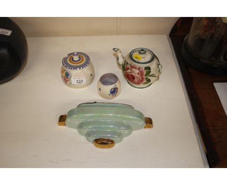 A Wemyss teapot  AF; a Poole pottery preserve jar and cover; a Poole pottery pot; and a Saddler wall pocket