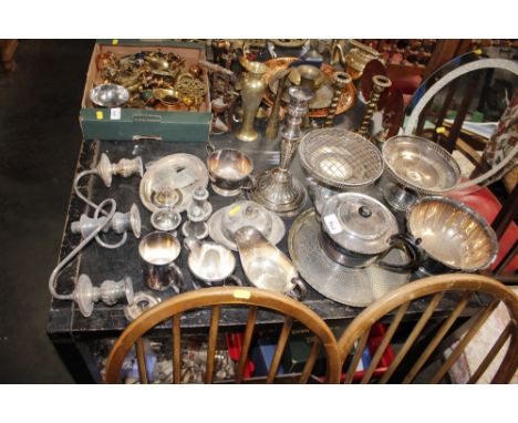 A quantity of plated ware to include salvers, comports, cream jugs, candelabra etc.