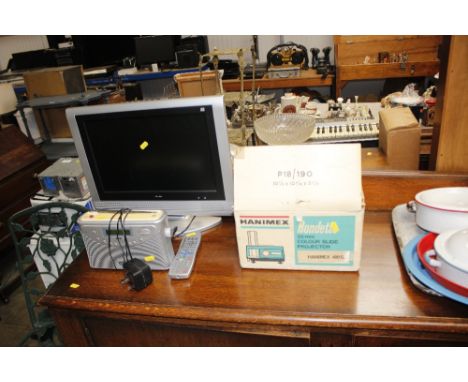 A Hanimex colour slide projector and screen in original box - sold as collector's item; a Roberts radio; and a small Bush fla