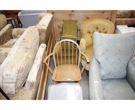 An Ercol rocking chair AF and a dralon upholstered pouffe and a gout stool