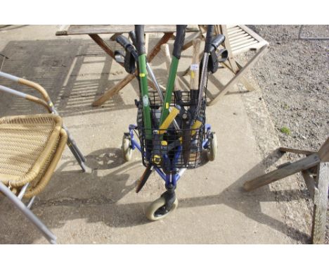 A mobility walker and a quantity of garden tools 
