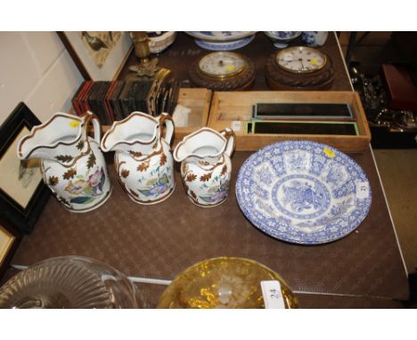 A pair of blue and white 19th Century Spode dishes; and three Victorian Staffordshire graduated jugs, one AF