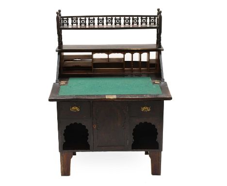 An Early 20th Century Oak Bureau, with a single shelf, having bobbin turned gallery, with panelled fall, on bracket feet, 79c