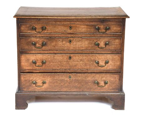 A George III Four Height Mahogany Chest of Drawers, with moulded rectangular top, wide mahogany banding and on bracket suppor