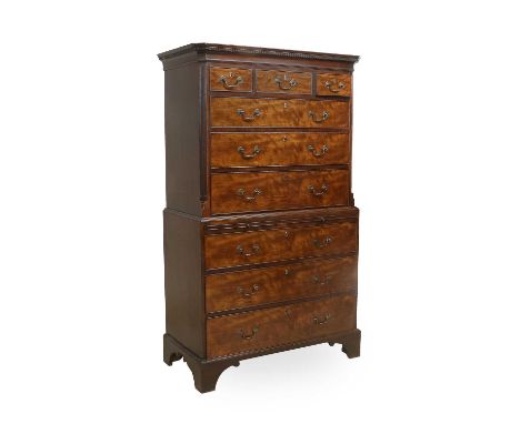 A George III Mahogany Chest on Chest, late 18th century, the moulded dentil cornice above three short oak-lined drawers and t