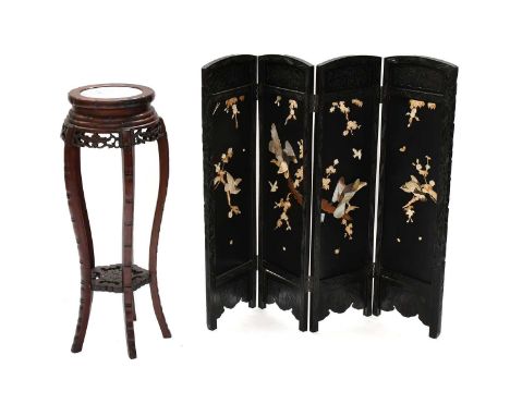 A Chinese Carved Hardwood Plant Stand, with grey marble top, on faux bamboo scroll supports, with a peony carved under tier, 