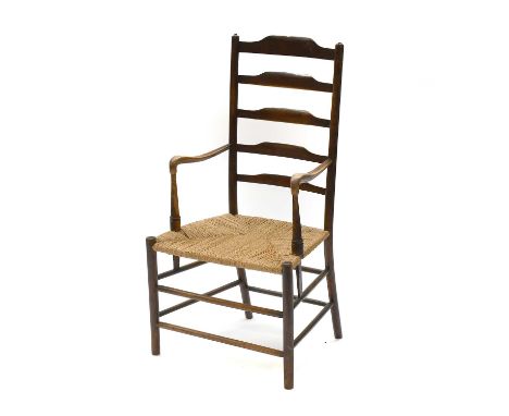 A 19th Century Ash Ladder Back Country Kitchen Armchair, with seagrass seat and on turned supportshas been re-roped, split an