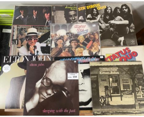 Records: Collectable albums including Rolling Stones (2), Status Quo (5), Elton John (5).
