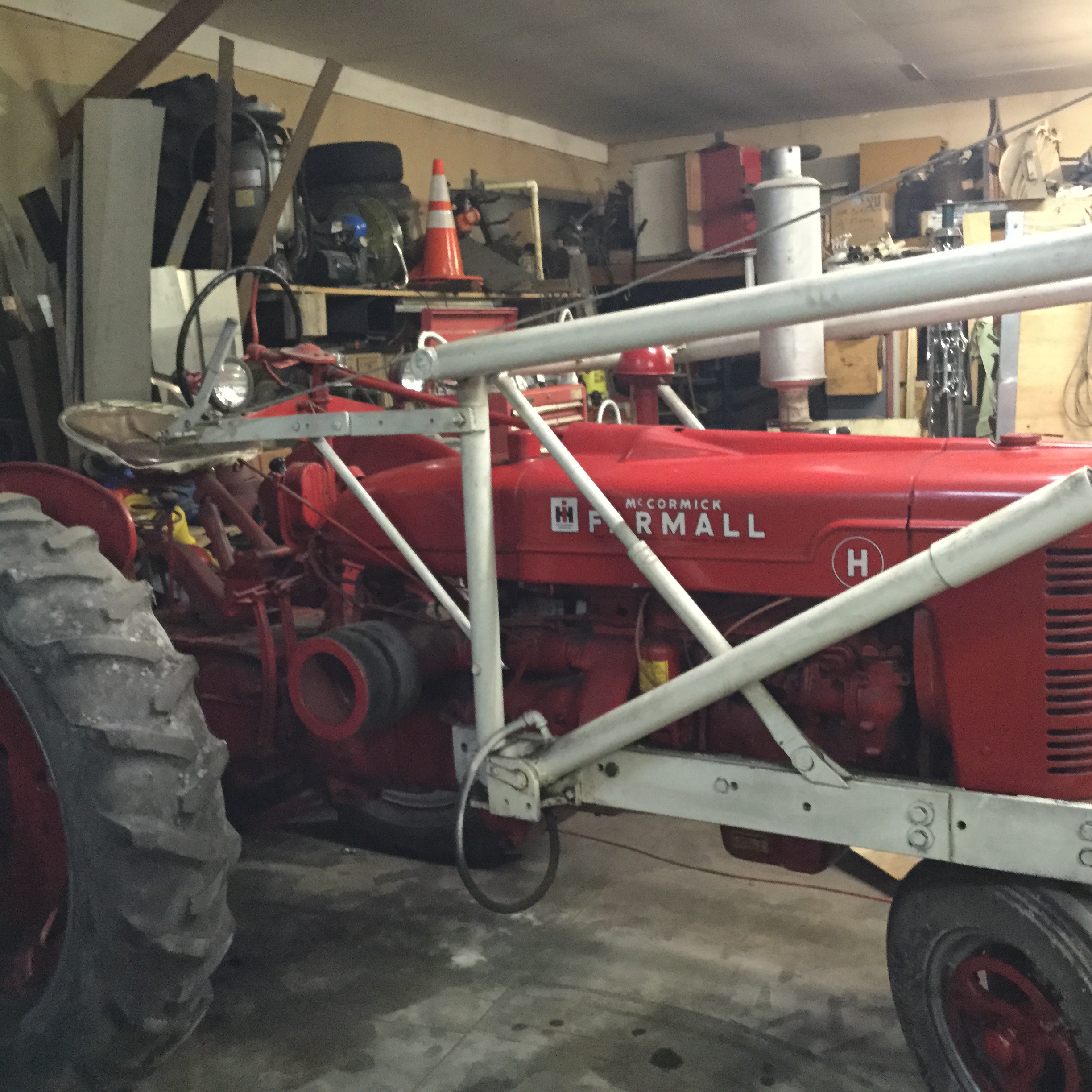 FarmallH Ser 244909 Tractor w/front end loader with dirt & manure