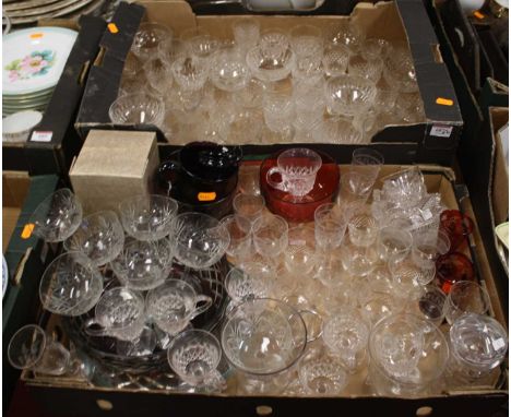 Two boxes of glassware to include drinking glasses and a ruby overlaid glass bowl 