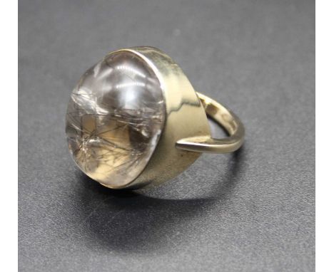 A 9ct gold and cabochon rock crystal set dress ring, 10.2g, rock crystal measuring approx 20 x 16 x 11mm, size K 