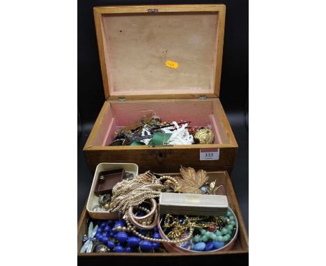 A 19th century mahogany and boxwood strung dome top box containing various items of costume jewellery to include paste set br