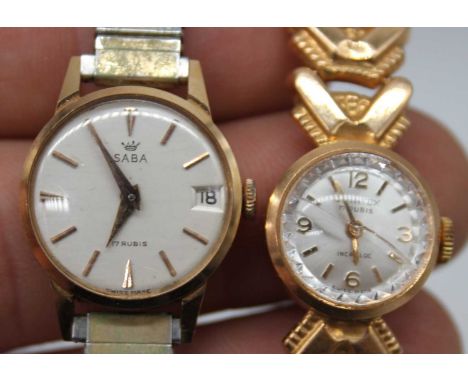 A ladies Grintex 18ct gold cased dress watch having a signed silvered dial, incabloc movement, and gold hinged triple lugs, c