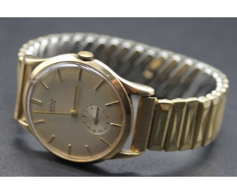 A gents Vertex Revue 9ct gold cased manual wind wrist watch, having 17 jewel Swiss movement, case dia. 34mm, and on replaceme