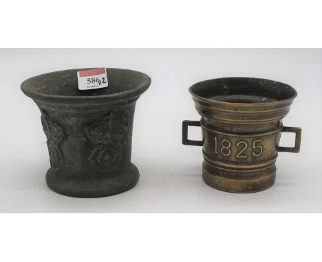 An antique bronze mortar, relief decorated with crowns and rosettes, h.11cm; together with another dated 1825 
