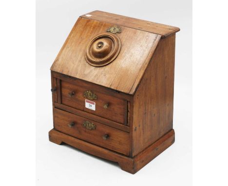 A 19th century mahogany apprentice bureau, the fall above two long drawers, standing on bracket feet, h.32cm 