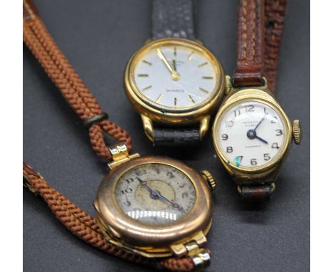 A vintage ladies 9ct gold cased wrist watch having manual wind movement, together with two other ladies wrist watches to incl