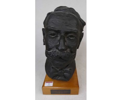 A 20th century plaster portrait bus of Elgar, signed Sheila A Scott, upon a pine plinth, h.31cm 