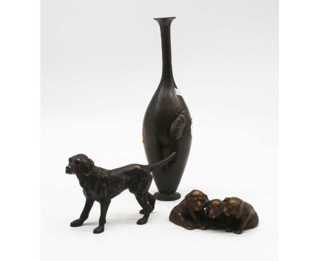 A bronze model of three puppies, w.12cm; together with a similar model of a dog and a Japanese vase (3)