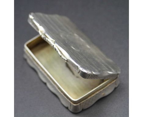 An early Victorian silver snuff box having bright cut engraved and banded decoration, maker Nathaniel Mills, 36g, width 5.5cm